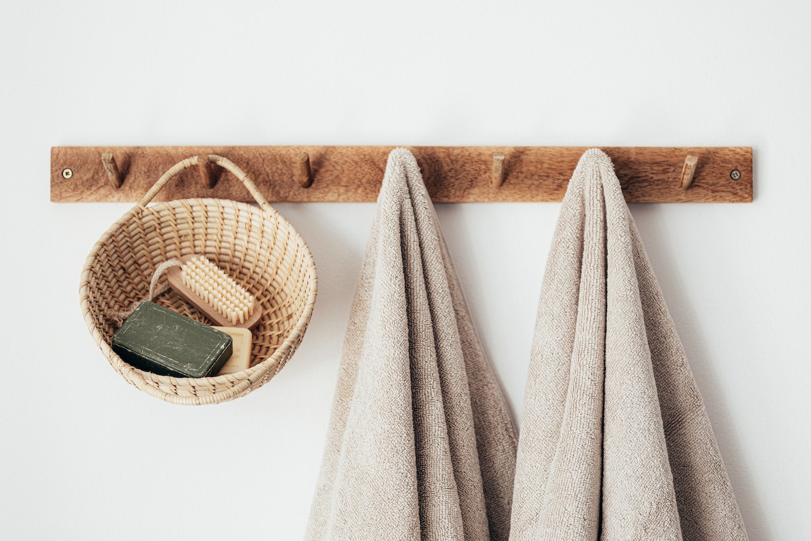 Towels hanging on coat rack